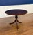 This 42” round mahogany table was made by Leighton Hall in its Suwanee, Georgia facility. It features a field of cathedral...