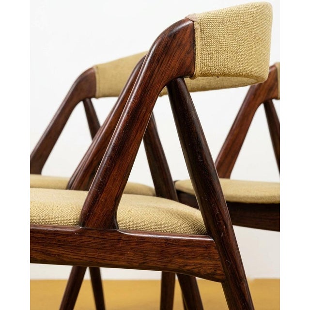 A set of five dining chairs attributed to Kai Kristiansen, Model 31 ("A-frame"), designed in 1956 and produced by Schou...
