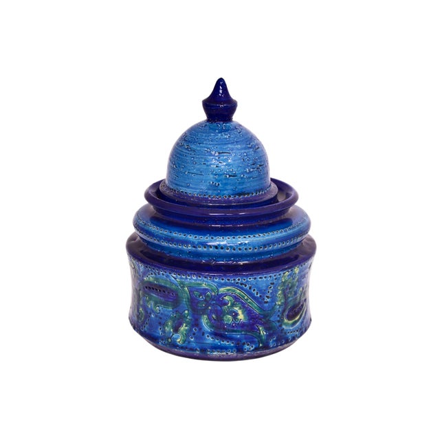 Mid-century modern Italian nine inch lidded jar designed by Aldo Londi as part of the "Rimini Blu" Collection, with a...
