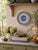A handsome late 20th-century Italian faience wall plate in the Deruta tradition, hand painted in cobalt blue with a...