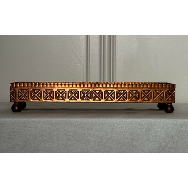 The vintage decorative hammered copper low gallery tray has a distinctive Arts & Crafts / Mission Revival influence. The...