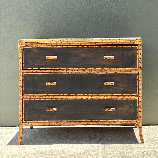 This vintage three-drawer dresser beautifully reflects mid-20th-century design through its refined balance of texture,...