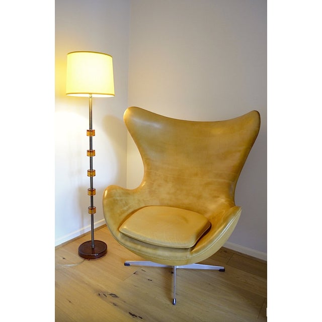 Scandinavian floor lamp by designer Carl Fagerlund for the Swedish glass manufacturer Orrefors. The floor lamp features...