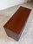 Newly refinished walnut and brass sideboard by Statton Furniture, featuring divided drawers and open storage cabinetry. In...