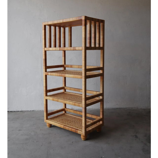 Great vintage vintage bookshelf in pristine condition. Unlike a lot of wicker pieces this bookshelf is very high quality...