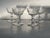 A set of four elaborately patterned champagne glasses in excellent condition. Ships within 1-2 days using USPS. All items...