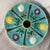 This is a rare Wedgwood majolica chrysanthemum cake or pastry stand featuring a vibrant turquoise ground and colorful...