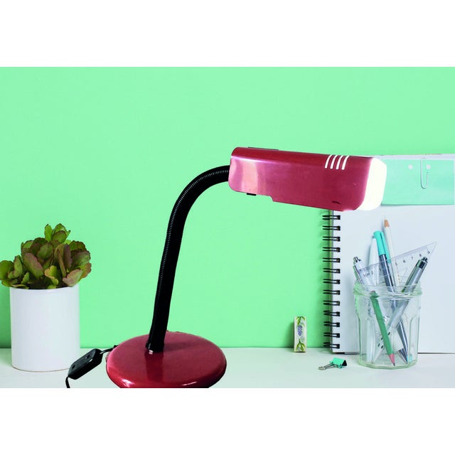 A great little red desk lamp with a strong fexible plastic arm to adjust the light anywhere you want. Its distinctive...