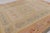 Hand-knotted in wool, this 12x14 antique French Savonnerie rug, dating to circa 1890-1900, is a graceful and highly...
