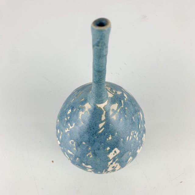 Incredible one of a kind studio pottery art vase with long skinny neck and fabulous blue drippy glaze bottom signed DJW....