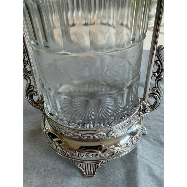 An elegant Victorian silver-plated serving vessel by WSP Co. (Wilcox Silver Plate Co.), retaining its original frosted and...