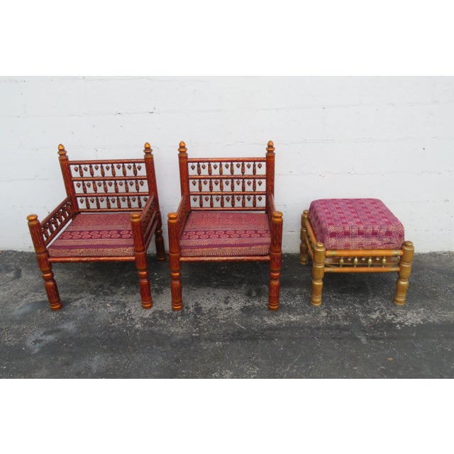 This Set of Side Chairs and Ottoman is made out of wood, upholstery, and they are in good condition. The set has Moroccan...