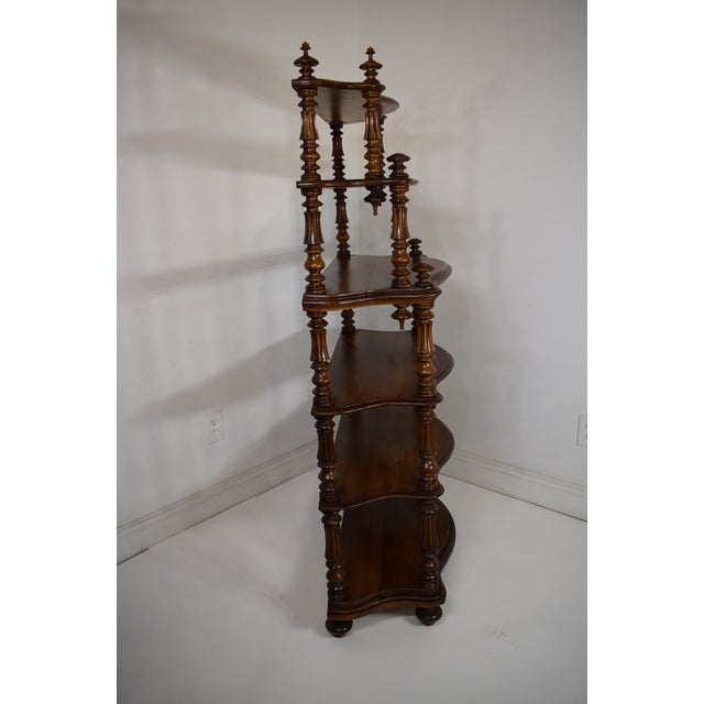 19th-Century French Walnut Bookshelf/Whatnot Display with six (6) shaped graduated shelves and turned column supports and...