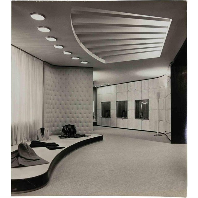 Vintage black and white photograph showing the interior of a fashion salon, most probably the NK Department Store...