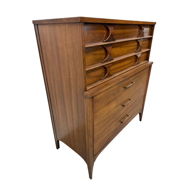 Elevate your bedroom with this stunning Mid-Century Modern Kent Coffey Perspecta walnut high chest, crafted in the 1960s...