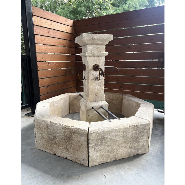 Hand-carved from 14 pieces of French limestone, this octagonal center fountain would make a wonderful addition to a large...
