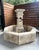 Hand-carved from 14 pieces of French limestone, this octagonal center fountain would make a wonderful addition to a large...