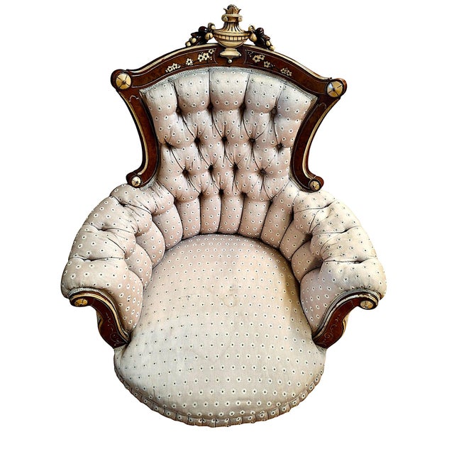 This elegant pair consists of an American Neo-Grec parlor set, including a luxurious gentleman's armchair and a smaller...