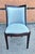 A Trouvailles Furniture Co. Glossy Varnished and Upholstered Accent Chair. Measures 18" in width, 23" in depth, 35" in...