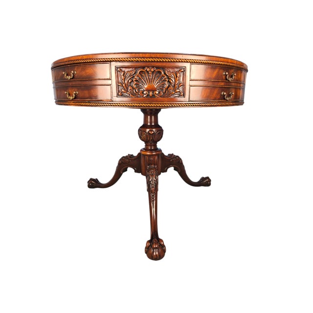 A mid-20th-century American mahogany drum table by Weiman Tables from the company's Heirloom Quality line, Model 5040. The...