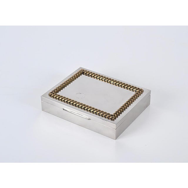 Beautiful midcentury decorative jewelry box in chromed metal and brass. This lovely Gucci style box was produced in Italy...
