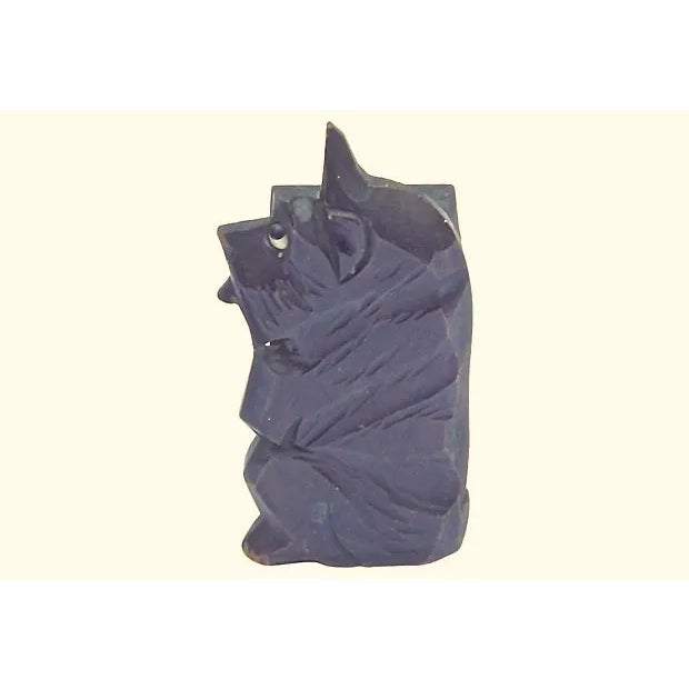 Vintage German Black Forest terrier pencil holder. Condition: minor wear Materials: wood/paper. No maker's marks. Minor wear.