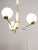 Real brass. Takes 3x e27 light bulb (not included). A standard e26 american/canadian size also fits (tested). Works with...