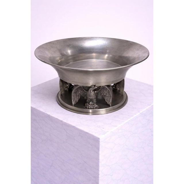 Striking Art Deco centerpiece bowl by Ystad Tenn, Sweden, clearly dated 1930. Crafted in solid pewter, this sculptural...