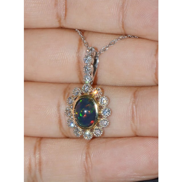 Gorgeous natural 2.77CTS diamond and black opal 18K solid gold slide pendant necklace. This pendant has a very fine...