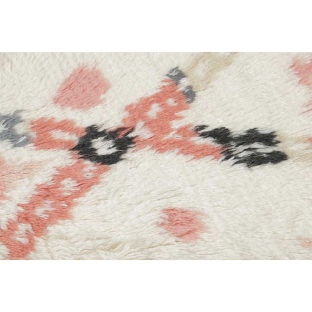 Hand-knotted in wool as a gift-sized rug, this 2x3 contemporary Moroccan shag rug joins Rug & Kilim’s Moroccan collection....