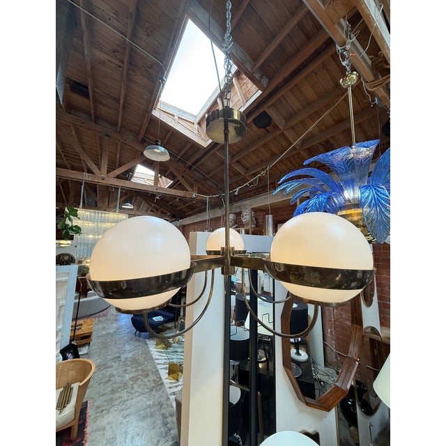 Inspired by the refined elegance of Nordic modern design, this 5-light chandelier is attributed to Heikki Turunen. The...