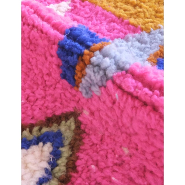 Introduce a touch of cozy comfort to your space with our Playful Moroccan Wool Rug. Measuring 8.1 x 5.9 ft, this berber...