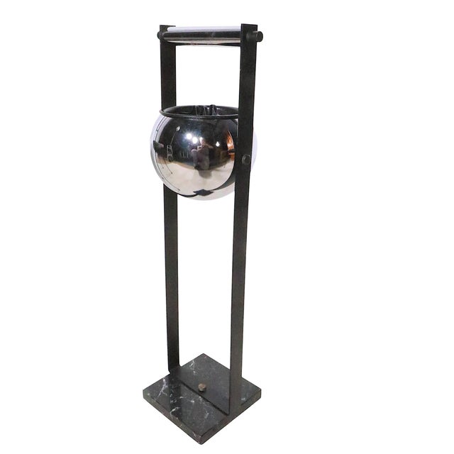 Chic Space Age modern floor standing ashtray, in chrome, black metal and marble. The ashtray is in very fine, clean and...