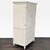 This ivory hutch & armoire features a spacious cabinet with double doors and a shelf, as well as four drawers for extra...