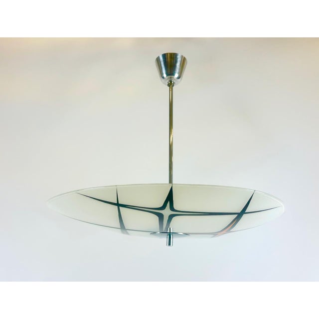 Mid-Century Modern Czech Pendant Lamp, 1960s, in Flawless conditions. Designed 1960 to 1969 European Plug (up to 250V).The...