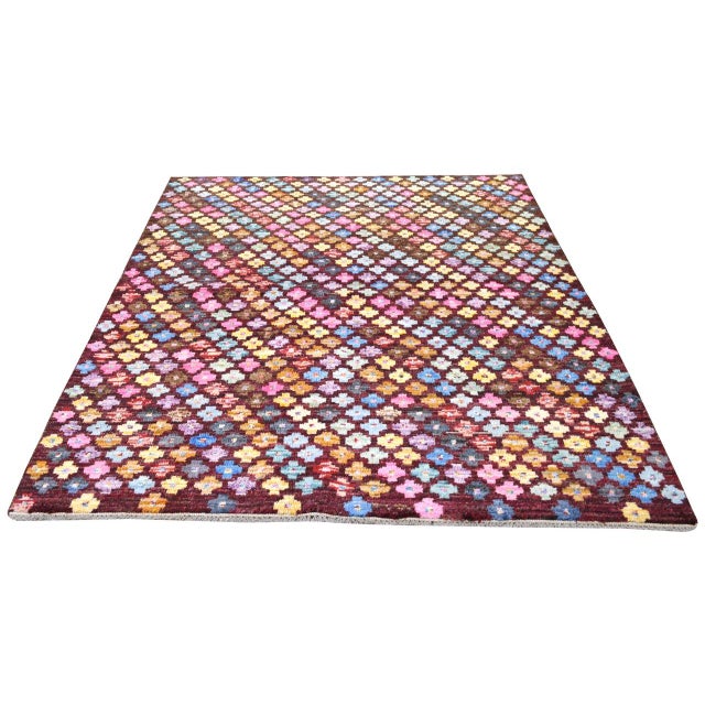 Hand-knotted with care using traditional rug-making techniques, this wool rug blends timeless craftsmanship with a modern...