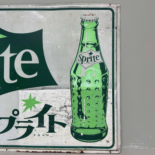Highly decorative vintage advertising sign for Sprite originating from Japan, dating from the 1970s-1980s. Dimensions:...