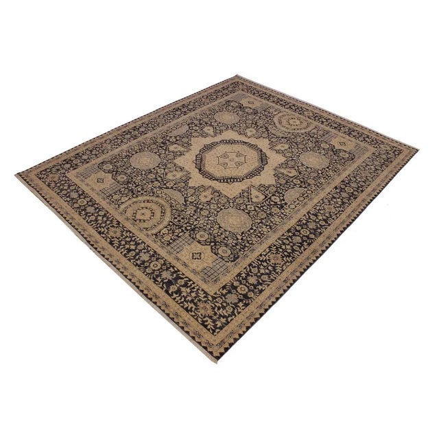 With strict standards of craftsmanship and quality of materials used this magnificent hand-knotted rug features a Mamluk...
