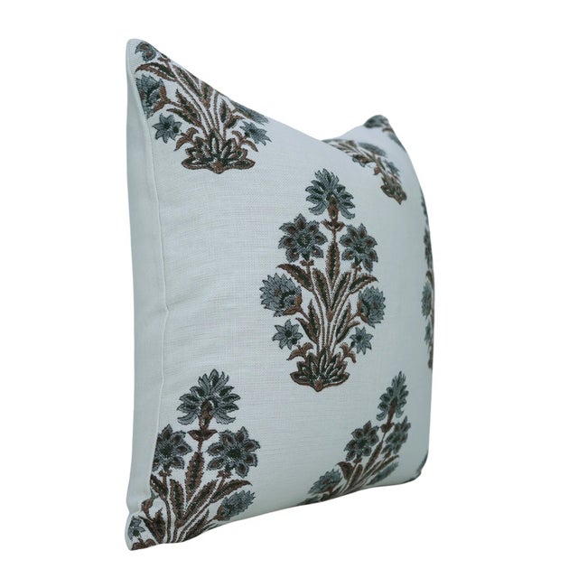 Inspired by the iridescent beauty of a peacock’s feather, the Morpankh cushion cover brings a graceful touch of tradition...