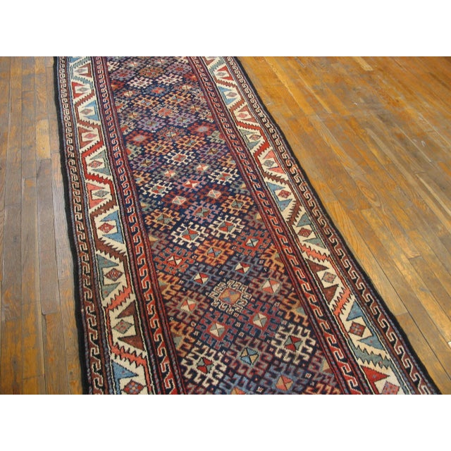 Antique Persian Kurdish rug, size: 3'3" x 11'9".