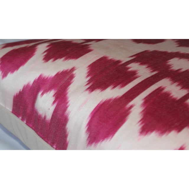 Bohemian silk ikat pillow with vibrant colors of red, beige and blue. Super hand soft. Pillow has a zipper for closure...