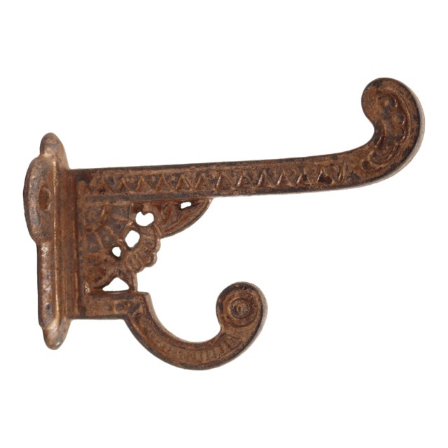 Antique Eastlake Distressed Cast Iron Wall Hook For Sale