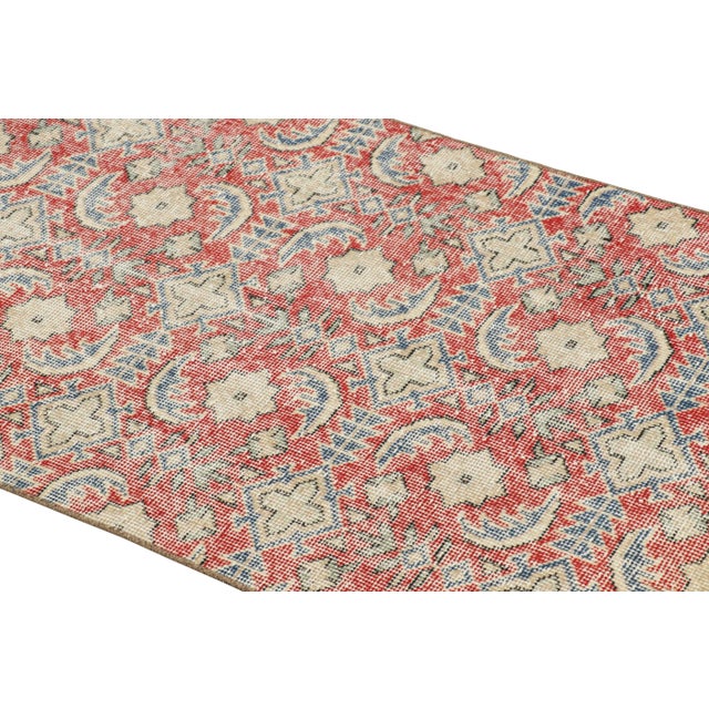 Hand-knotted in wool and originating from Turkey circa 1960 – 1970, this 2x6 vintage Zeki Müren runner is a unique...