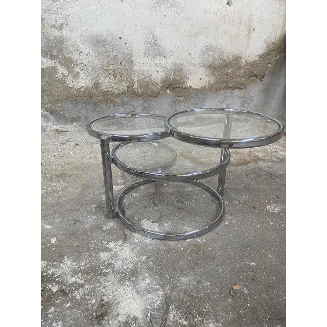 Mid-Century Modern Italian Chrome and Glass Coffee Table with Rotating Tops, 1970s, in Very Good conditions. Designed 1970...