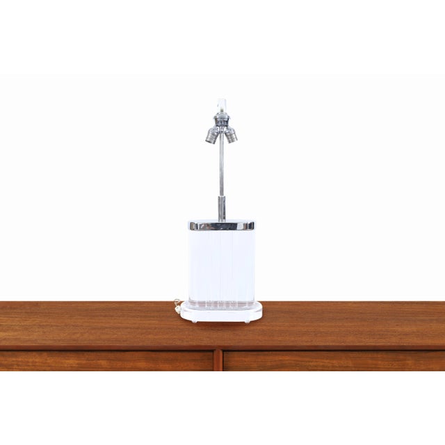 This striking vintage table lamp captures the glamour and sculptural presence that made 1970s American design so...