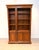 Elegant open bookcase cabinet from the "Antique Collection" series, crafted in warm cherrywood with a rich traditional...