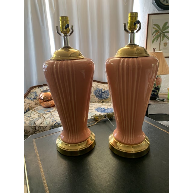 Here we have a fabulous matching pair of large ceramic table lamps. Gorgeous peachy coral glaze and Art Deco styling with...