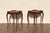 An exquisite pair of Louis XV Revival side tables, showcasing the elegance and artistry of French Rococo design....