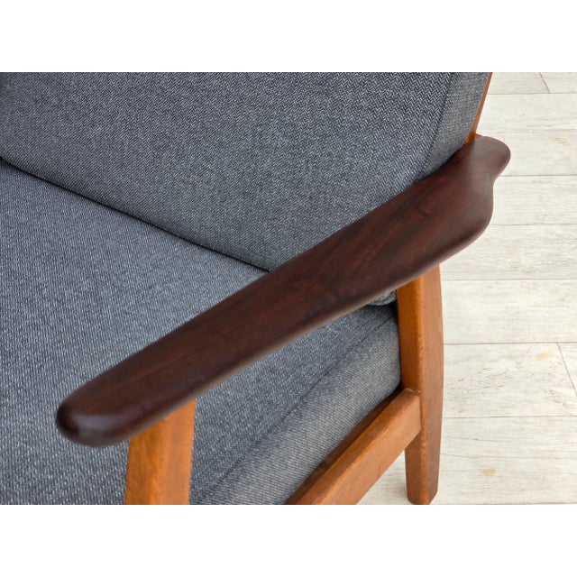 1970s, pair of Danish armchairs. New reupholstered, wood renewed. Quality blue furniture wool, teak wood armrests, oak...