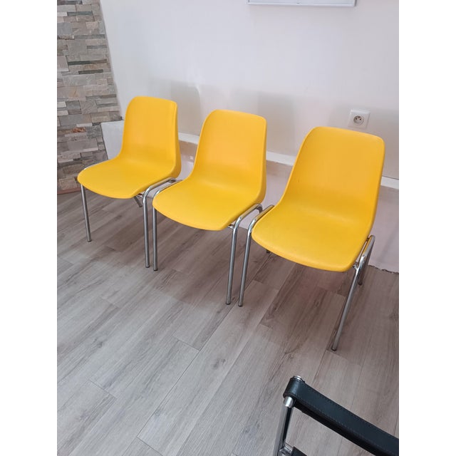 Beautiful set of three stackable chairs, Hélène model by Bricoplast. Brendola - Vicenza, Italy, 1990s. Tubular chrome-...